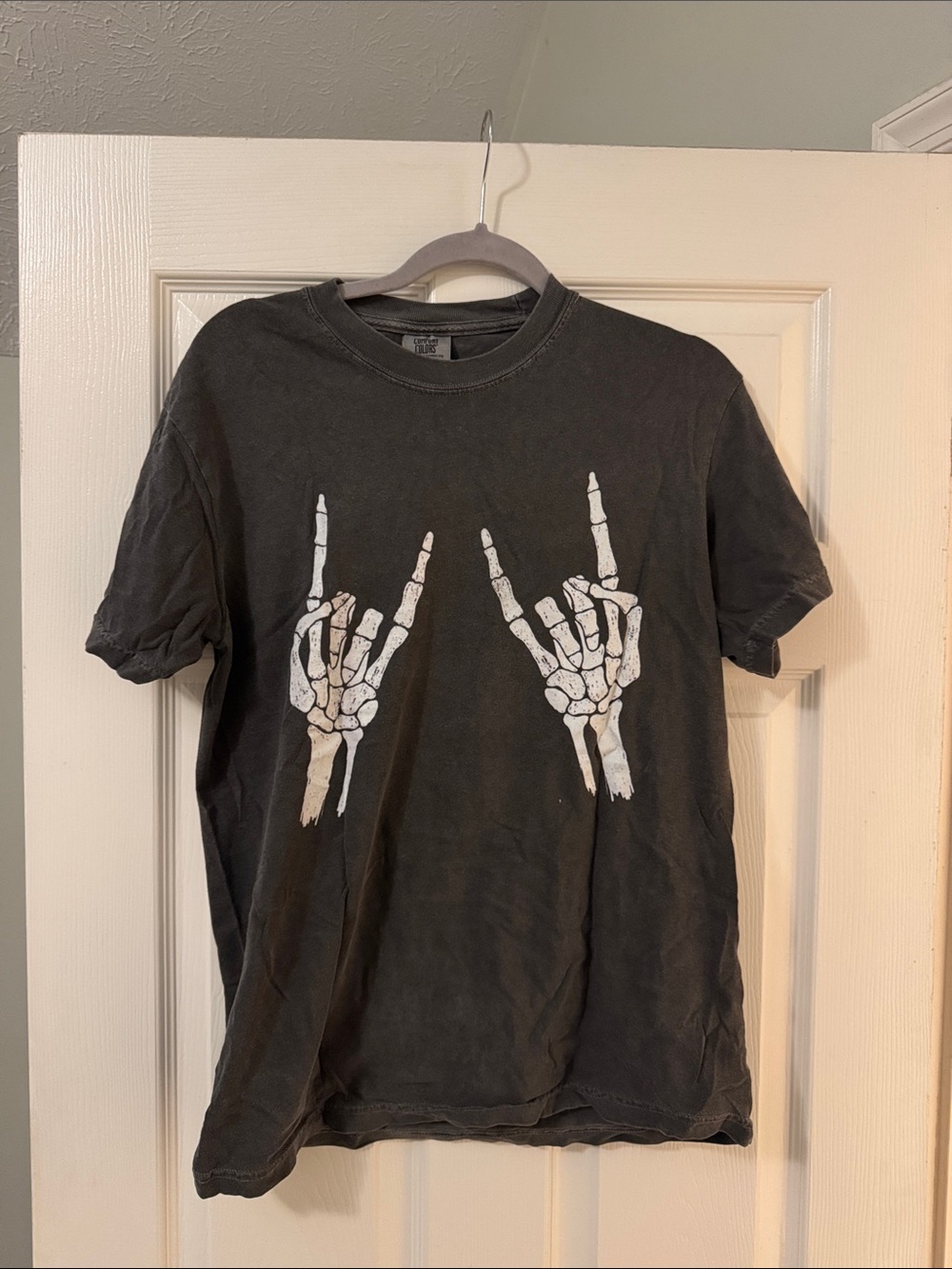 Dark Gray Graphic Tee with White Skeleton Rock on Hands